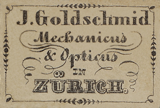 Alte Visitenkarte für "J. Goldschmidt Mechanicus & Optics in Zurich", likely von Anfang des 20. Jahrhunderts, die die Dienstleistungen des Unternehmens auflistet.
